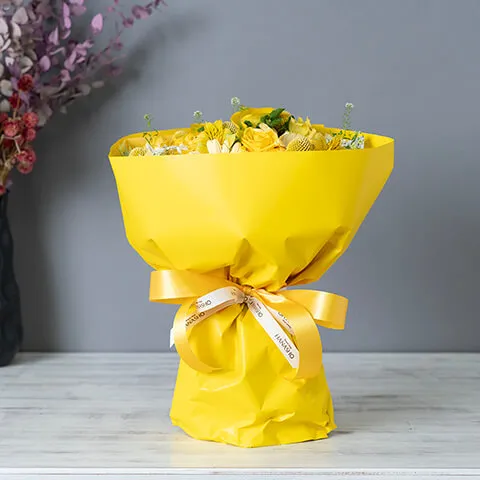 季節の花でビタミンイエロー スタンディングブーケ