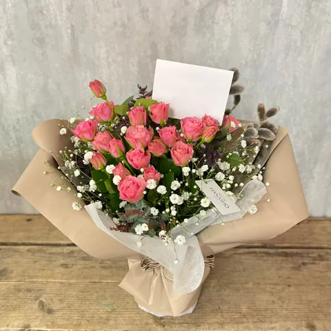 ピンク薔薇のスタンディングブーケ画像