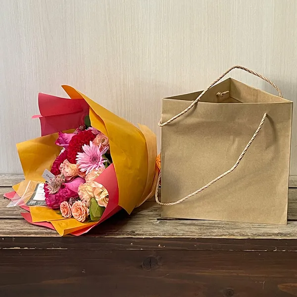 ピンク系花束袋付き
